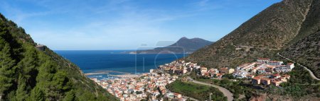Photo for Town on the sea coast, Buggerru, Sardinia, Italy. Sunny Fall Season Day. Panorama - Royalty Free Image