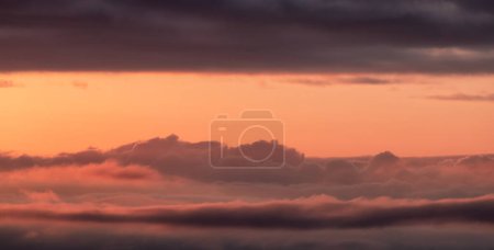 Foto de Aerial Cloudscape during morning Sunrise Sky. British Columbia, Canada. Nature Background - Imagen libre de derechos