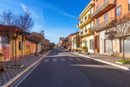 Foto de Street Road in a small country town, Sindia, Sardinia, Italy. Sunny Fall Season Day. - Imagen libre de derechos