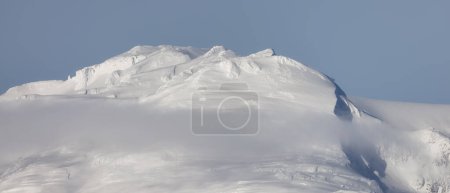 Photo for Snow and Cloud covered Canadian Nature Landscape Background. Winter Season in Whistler, British Columbia, Canada. From Blackcomb Mountain - Royalty Free Image