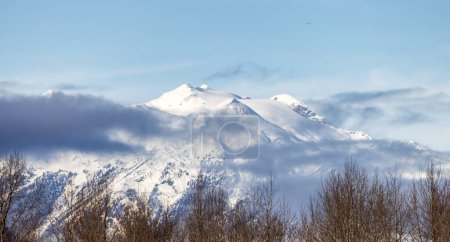 Photo for Snow and Cloud covered Canadian Nature Landscape Background. Winter Season in Squamish, British Columbia, Canada. Sunny Sky - Royalty Free Image