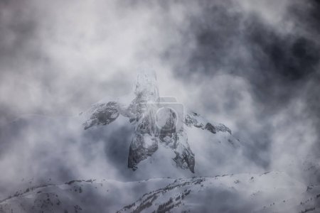 Photo for Snow and Cloud covered Canadian Nature Mountain Landscape Background. Winter Season in Whistler, British Columbia, Canada. - Royalty Free Image