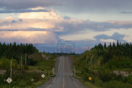Photo for Scenic Road in the Canadian Nature Mountain Landscape during Fall Season. Taken in Yukon, Canada. - Royalty Free Image