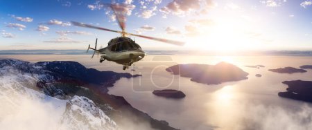 Photo for Helicopter flying over Canadian Mountain Landscape on West Coast. Adventure Travel Concept. 3d Rendering Heli. Aerial View near Squamish and Vancouver, BC, Canada. - Royalty Free Image