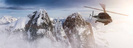 Foto de Helicóptero volando sobre las Montañas Rocosas durante una colorida puesta de sol. Paisaje aéreo desde BC, Canadá cerca de Squamish. Epic Adventure Composite. Representación 3D Heli - Imagen libre de derechos