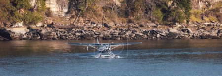 Photo for Seaplane in Water ready for Take off with Rocky Shore in Background. Nanaimo, Vancouver Island, British Columbia, Canada. - Royalty Free Image