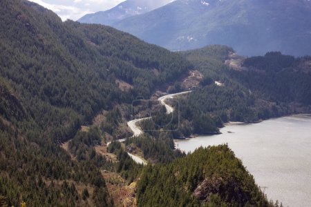 Photo for Aerial view of Sea to Sky Highway in Squamish, BC, Canada. Vibrant Sunny Day. Zoom - Royalty Free Image