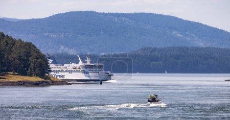 Photo for Gulf Islands, British Columbia, Canada - May 19, 2023: BC Ferries Passing By the islands on the West Coast of Pacific Ocean. - Royalty Free Image