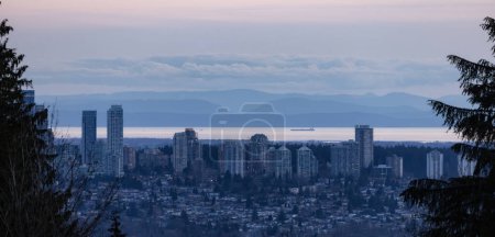 Photo for Apartment Buildings in Metro Vancouver Area. Twilight Sunset. Burnaby Mountain, BC, Canada. - Royalty Free Image
