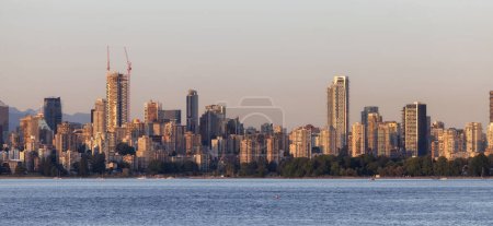Photo for City Buildings on the West Coast of Pacific Ocean. Downtown Vancouver, BC, Canada. Sunny Sunset. Panorama - Royalty Free Image