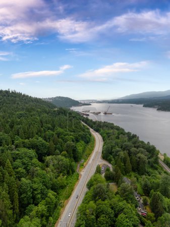 Photo for Aerial View of a Highway in City. Cloudy Sky. Port Moody, Vancouver, BC, Canada. Sunset Sky Art Render - Royalty Free Image