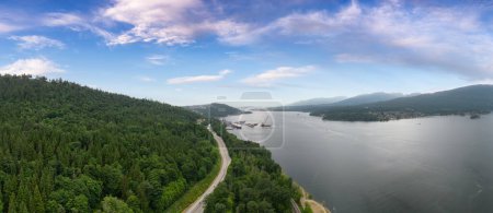 Photo for Aerial View of a Highway in City. Cloudy Sky. Port Moody, Vancouver, BC, Canada. Sunset Sky Art Render. Panorama - Royalty Free Image