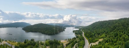 Photo for Aerial View of a Highway in City. Cloudy Sky. Port Moody, Vancouver, BC, Canada. Cloudy Sky Art Render. Panorama - Royalty Free Image
