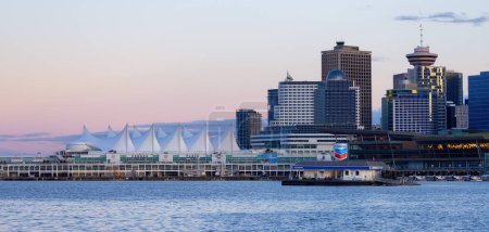 Photo for Downtown Vancouver, British Columbia, Canada - June 16, 2023: Modern City Skyline at Sunset. Canada Place. - Royalty Free Image