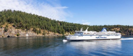 Photo for Galiano Island, British Columbia, Canada - July 23, 2023: BC Ferries Boat in Pacific Ocean during cloudy summer day. - Royalty Free Image
