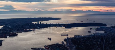 Photo for Downtown Vancouver, British Columbia, Canada on the West Coast of Pacific Ocean. Sunset Sky. Aerial Panorama - Royalty Free Image