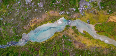 Photo for Aerial View of River in Vibrant Green Meadows in the Canadian Mountain Landscape. British Columbia, Canada. Nature Background. - Royalty Free Image