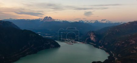 Photo for Canadian Mountain Landscape on the West Coast of Pacific Ocean. Aerial Nature Background. Sunset Sky. Howe Sound, British Columbia, Canada. - Royalty Free Image