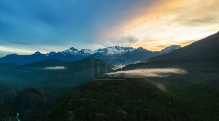 Photo for Aerial Canadian Mountain Landscape. Nature Background Panorama. Dramatic Sunset. British Columbia, Canada. - Royalty Free Image