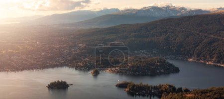 Photo for Residential Homes at Deep Cove. North Vancouver, BC, Canada. Aerial Panorama. Sunset. - Royalty Free Image