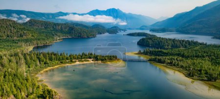 Vibrant lake and mountain landscape in Canadian Nature. Kennedy Lake, Vancouver Island, BC, Canada.
