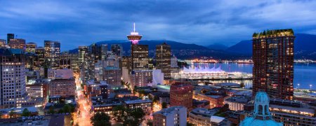 Photo for Downtown Vancouver City at night after sunset. Aerial Panorama. BC, Canada. - Royalty Free Image