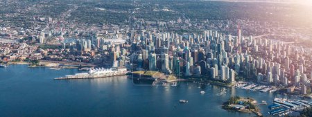 Photo for Downtown Vancouver, British Columbia, Canada. Aerial Panoramic View of the Modern Urban City, Stanley Park, Harbour and Port. - Royalty Free Image