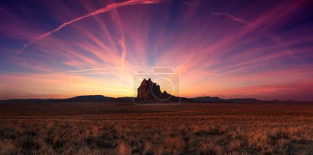 Ship Rock in the desert of New Mexico, United States. Nature Background. Sunset Sky