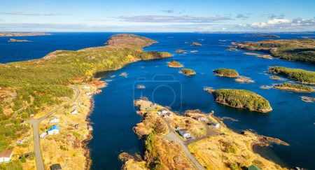Photo for Small Town, Coast on East Coast of Atlantic Ocean. Aerial Nature Background. Sunny Blue Sky. Newfoundland, Canada. - Royalty Free Image