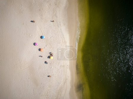 Photo for Beautiful top down aerial view to Flamengo Beach water and umbrellas in Rio de Janeiro, Brazil - Royalty Free Image