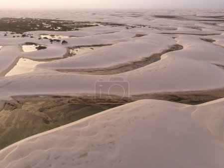 Photo for Beautiful view to white sand dunes and rainwater pools in Lenis Maranhenses, near Barreirinhas, Maranho, Brazil. - Royalty Free Image