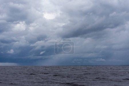 Photo for Beautiful view to large river and big rain clouds in the Amazon Rainforest, near Manaus, Amazonas State, Brazil - Royalty Free Image