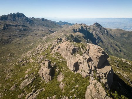 Photo for Beautiful aerial drone view to rocky mountains and altitude fields in Itatiaia National Park, Rio de Janeiro, Brazil - Royalty Free Image