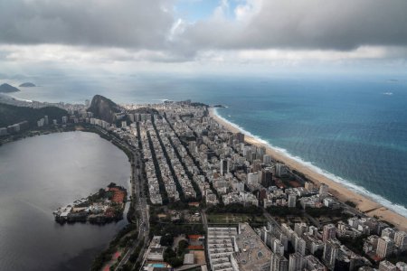 Photo for Beautiful aerial view to ocean beach, lagoon and city buildings in Rio de Janeiro, Brazil - Royalty Free Image
