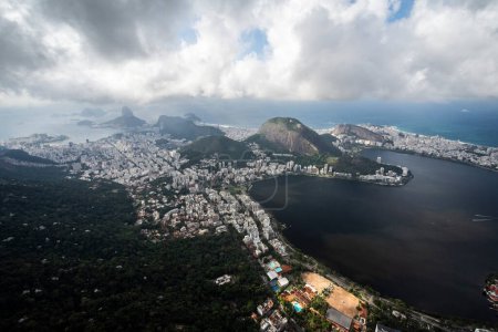 Photo for Beautiful aerial view to lagoon, hills and city buildings in Rio de Janeiro, Brazil - Royalty Free Image