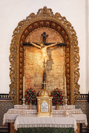Photo for Huelva, Spain-December 4, 2022: Image of Jesus Christ crucified inside the parish of San Bartolome in the municipality of Beas. It is consecrated under the invocation of the apostle Saint Bartholomew - Royalty Free Image