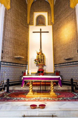 Photo for Huelva, Spain-December 4, 2022: Main Altar of the parish of San Bartolome, the most important building the municipality of Beas. It is consecrated under the invocation of the apostle Saint Bartholomew - Royalty Free Image