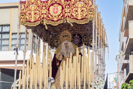Photo for Holy week passage of Holy Mary of the Rosary in her Sorrowful Mysteries, Maria Santisima del Rosario en sus Misterios Dolorosos in procession through the streets of Huelva, Andalusia, Spain - Royalty Free Image