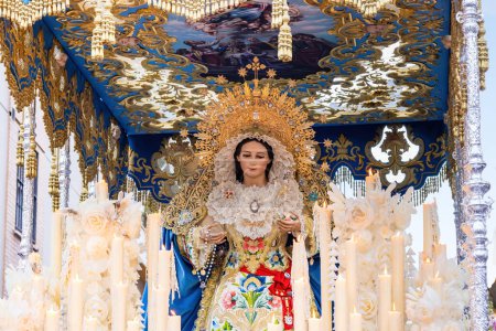 Photo for Holy Week Procession of the Paso (Platform or Throne) Our Lady of the Angels, Nuestra Senora de Los Angeles, through the streets of the city of the La Borriquita brotherhood - Royalty Free Image