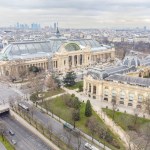 Aerial drone view of the Great Palace of the Elysian Fields (in French Grand Palais des les Champs-elyses), is a historic site, exhibition hall and museum complex located at the Champs-elyses