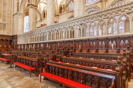 Photo for Canterbury, UK-May 20, 2023: Wooden chorus inside Canterbury Cathedral in Kent. One of the oldest and famous Christian churches in UK. Its Archbishop is leader of the worldwide Anglican Communion - Royalty Free Image