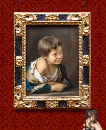 Foto de Londres, Reino Unido-19 de mayo de 2023: Pintura de Bartolomé Esteban Murillo titulada Un niño campesino apoyado en una enfermedad expuesta en la National Gallery de Londres, Inglaterra - Imagen libre de derechos