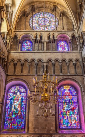 Photo for Canterbury, UK-May 20, 2023: Beautiful stained glass windows and hanging chandelier inside Canterbury cathedral in Canterbury, Kent, United Kingdom - Royalty Free Image