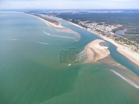 Aerial view of the Rompido Arrow (La Flecha del Rompido), a sand bank formed on the Rompido and Portil beaches that already reaches La Bota beach, in the municipality of Punta Umbria, Huelva province