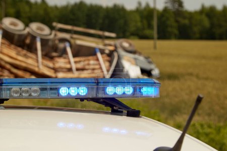 Photo for Police car blue lights on a car accident place - Royalty Free Image