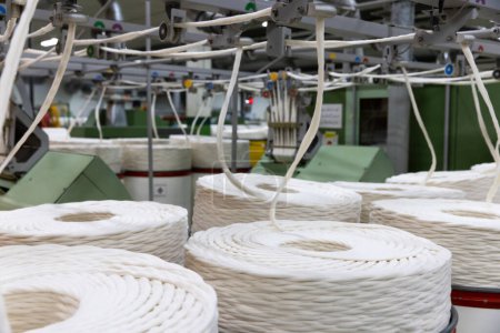 Photo for Cotton yarn production at fabric manufacture - Royalty Free Image