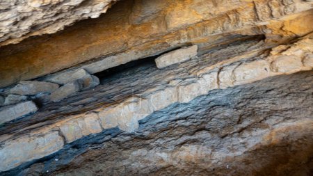 Photo for Close-up metamorphic rock in layers in cave - Royalty Free Image