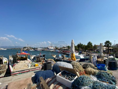 Photo for Urla, Izmir, Turkey 10, Sept,2023 : Small port of Urla with fishing and touristic daily boat tour yatchings. Urla is popular tourist attraction in Seferihisar, Izmir, Turkey. - Royalty Free Image