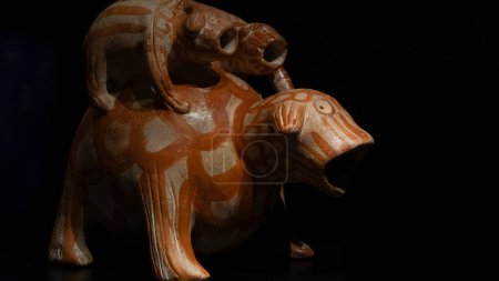 Photo for Canakkale, Turkey - Nov 19, 2023  Early Bronze Age Anatolian Frog-shaped Rhyton; earthenware pottery vessel.Exposition of ancient art at the Archaeological museum - Royalty Free Image