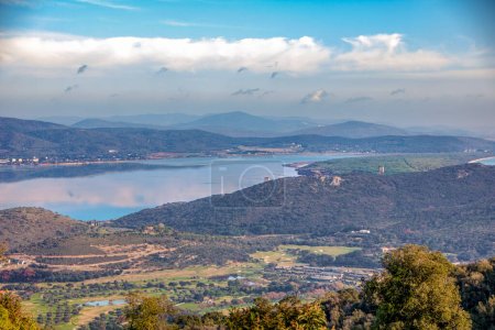 Photo for Landscape of Orbetello lagoon and the Tuscan archipelago as seen from the  Monastery of the Passionist Fathers.on Argentario mount in maremma tuscany,Italy - Royalty Free Image